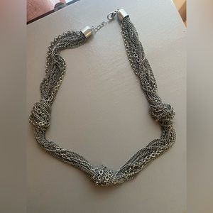 Silver necklace.